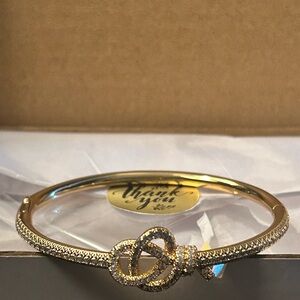 Elegant Gold Knot Bangle with Rhinestones